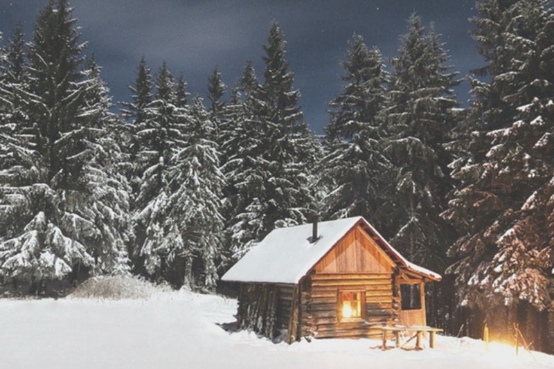 Cabin in the woods in winter