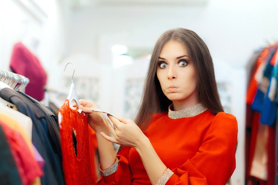 Woman startled by the price of a dress