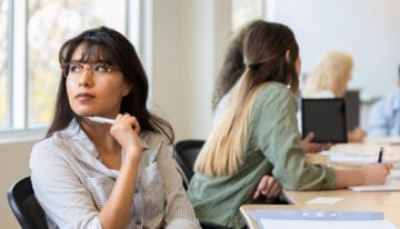 woman wondering if it's time to refinance student loans