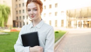 Girl standing on college campus