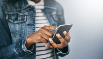 Woman holding a smartphone