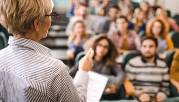 Professor teaching a college class