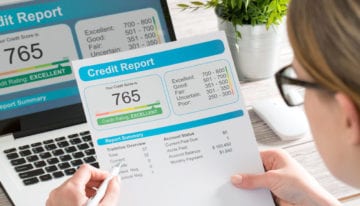 Woman holding credit report