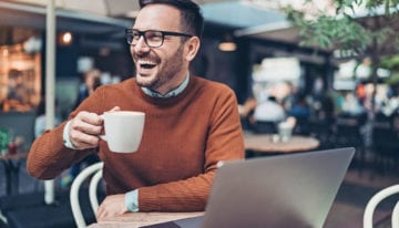 Man reading student loan news