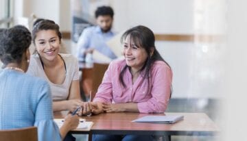 Mother and daughter discussing cosigning a student loan