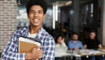 Student planning his loan repayment strategies