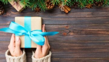 Woman holding wrapped present