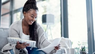 Woman figuring out which expenses she can pay with her 529 plan