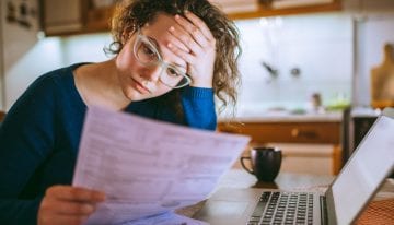 Woman thinking about filing bankruptcy on her student loans