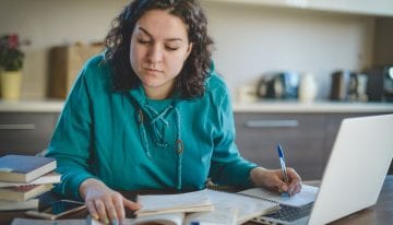 Woman calcluating how to pay for college