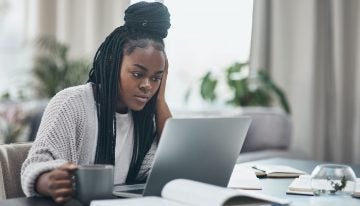 young woman using a laptop