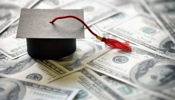 Graduation cap on money