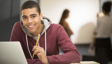 male student at desk