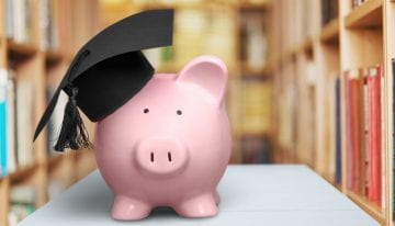 piggy bank with graduation cap