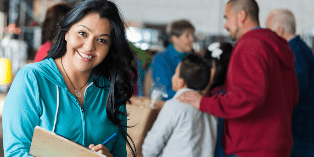 Woman smiling working at nonprofit organization.