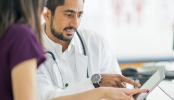 Male doctor talking to patient