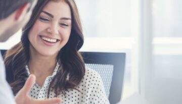 Woman using the student loan payment pause to get her finances in order
