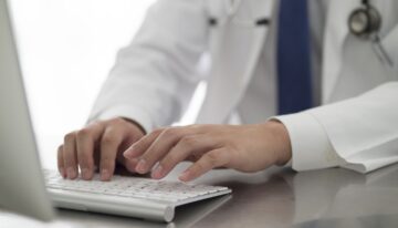 Doctor working at his desk