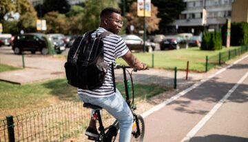 Male student commuting to college
