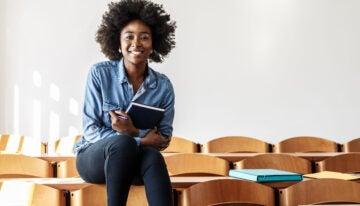 Female college student attending class for a double major.