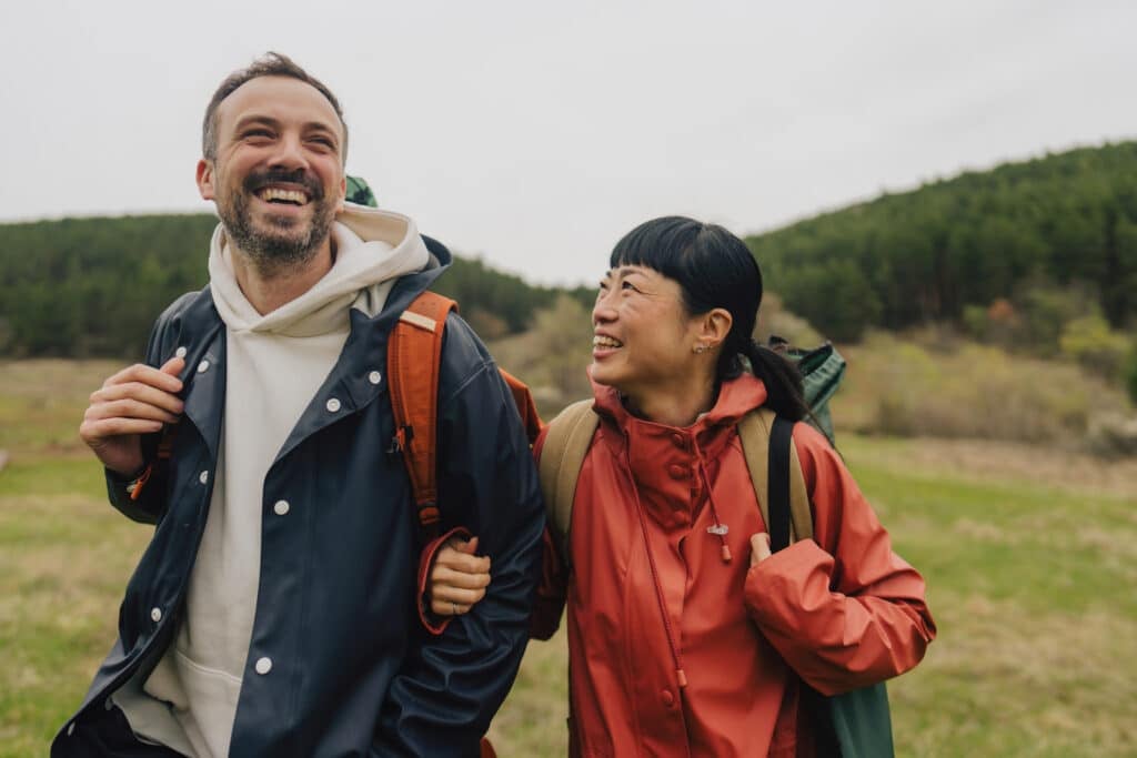 Photo of a happy couple on the road trip