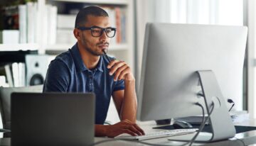 Man deciding if now is the right time to refinance student loans