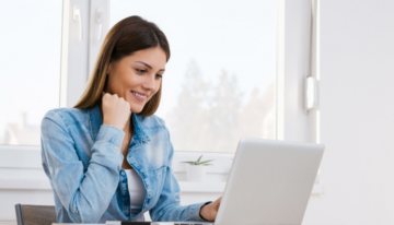 Female college student comparing financial aid packages.