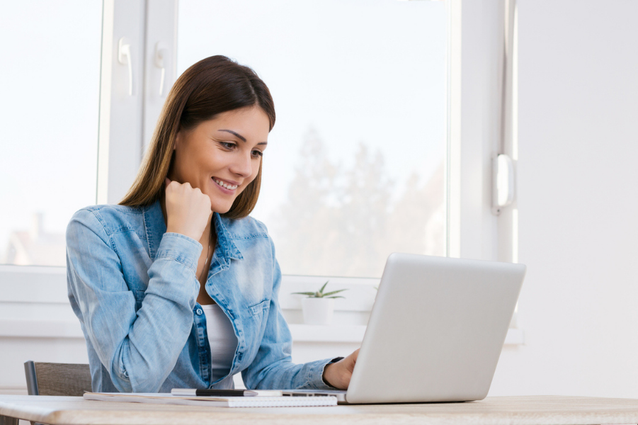 Female college student comparing financial aid packages.