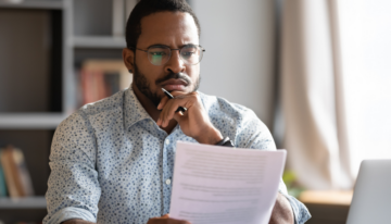 man looking over finances