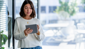 woman researching refinancing on tablet