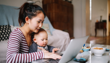 Asian woman looking at college savings for her child