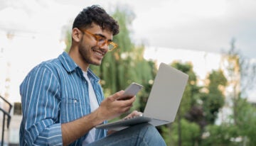 Young male reading about unsecured debt