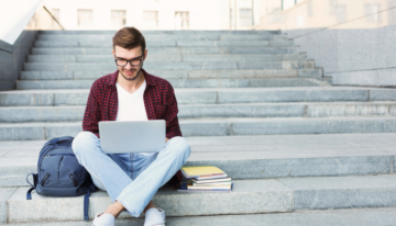 Male college student looking to transfer schools with student loans.