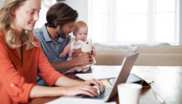 Mother and father researching what a 529 plan is.