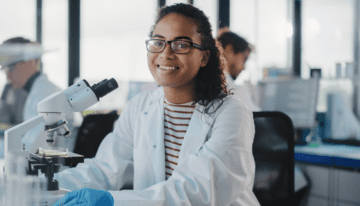 Black female STEM student in a lab.