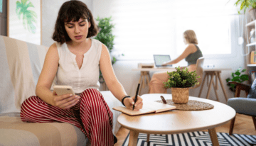 Young college female going over new income driven repayment plan for student loans.