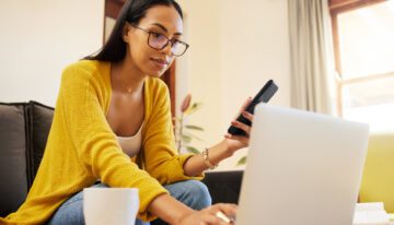 Young woman looking at how applying for a mortgage affects credit score.