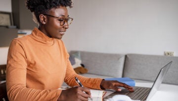 young woman managing her student loan payments