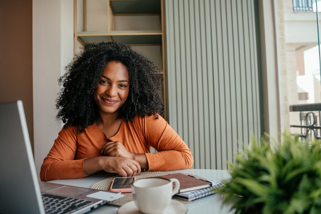 Portrait of woman making online purchase at home