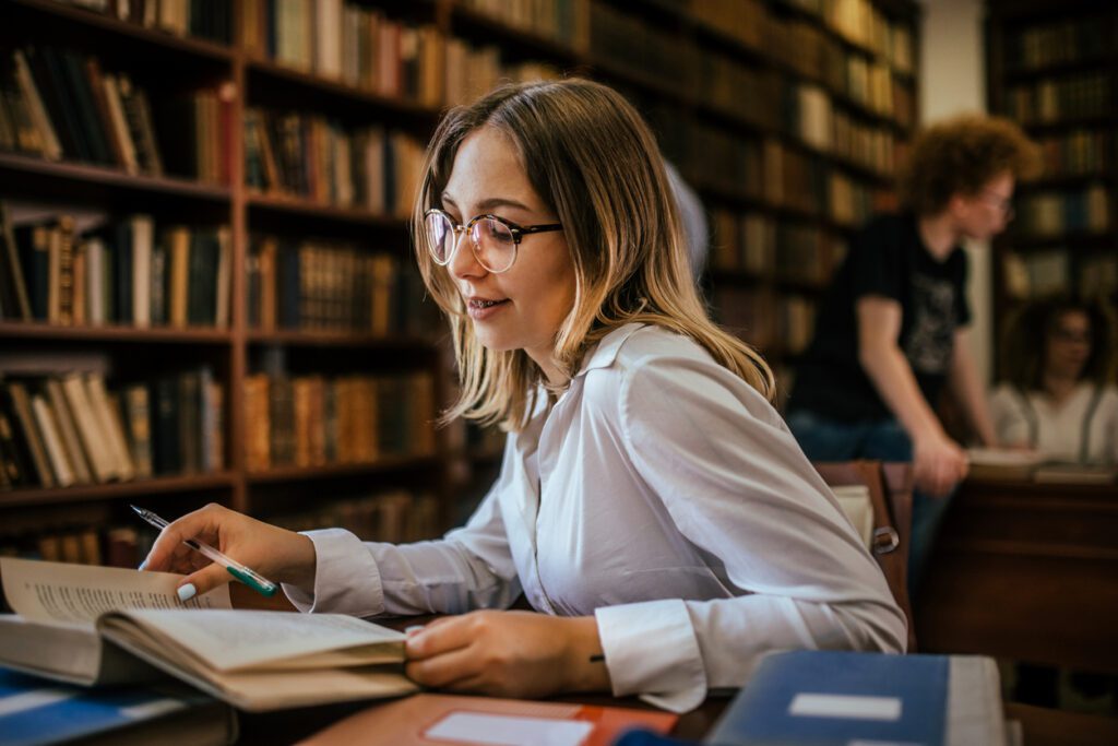 young students study and learn in the school library